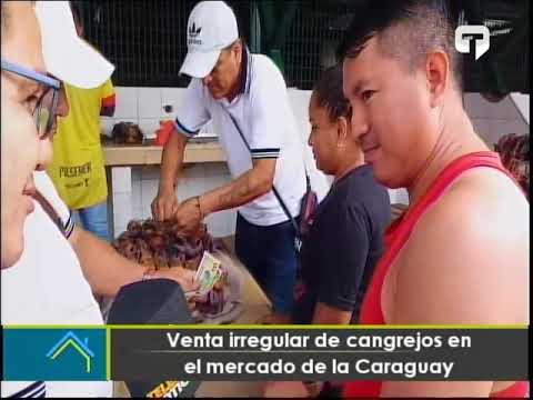 Venta irregular de cangrejos en el mercado de Caraguay