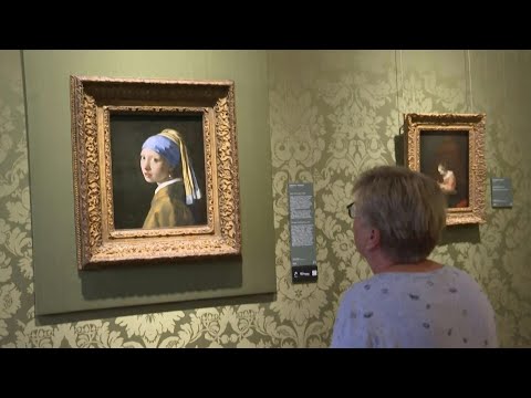 Científicos tratan de revelar el secreto del lienzo de Vermeer La joven de la perla | AFP