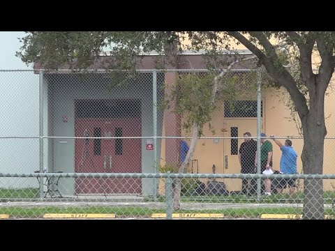 Shots fired in reenactment at school massacre site