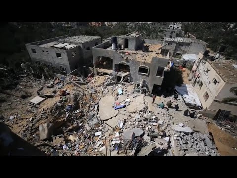 Palestinians search through rubble of homes after deadly Israeli airstrike on Deir al-Balah