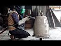 Buddhist Temple Bell Making Process. 70 Year Old Korean Traditional Bell Factory