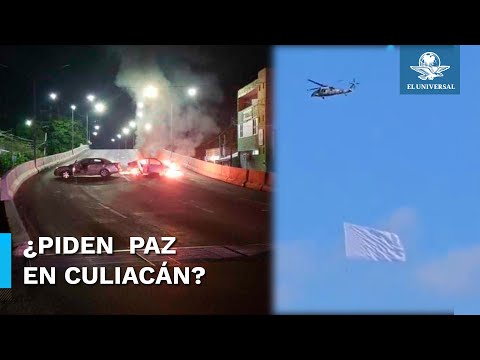 Captan helicóptero con bandera blanca sobrevolando Culiacán