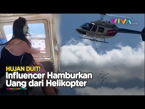 Wanita Ini Jatuhkan Uang Puluhan Juta dari Helikopter, Wisatawan Berhamburan