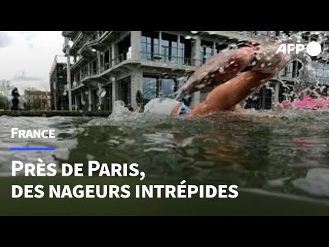 Nager dans la Seine ? Des pionniers profitent déjà de la nage en eau libre près de Paris | AFP