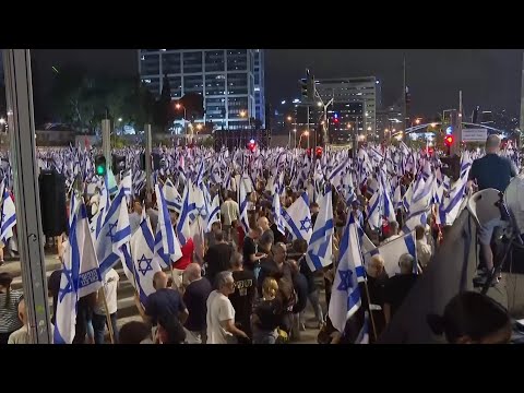 Sea of Israeli flags at rally against Benjamin Netanyahu's legal overhaul
