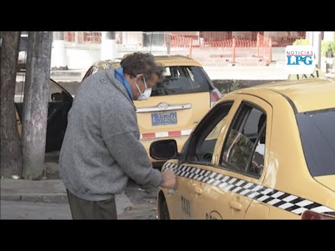 Taxistas afectados por la falta de pasajeros durante la pandemia por covid-19