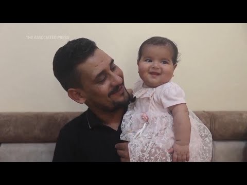 Syria quake rescue baby now with loving family