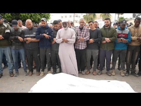 Palestinians in central Gaza hold funeral for victims of Israeli aistrike