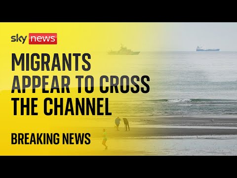 Migrants appear to cross the Channel from France