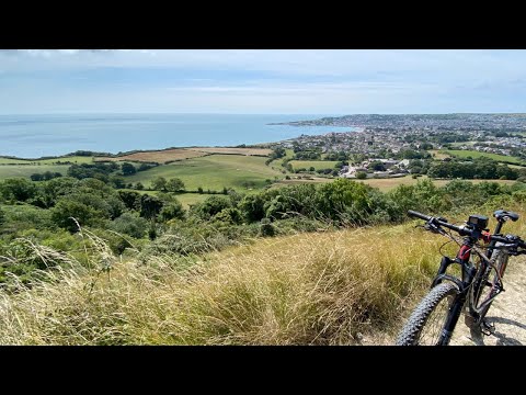 Click to view video 4K Cycle around the Isle of Purbeck and Jurassic Coast Swanage and Studland with Old Harry Rocks