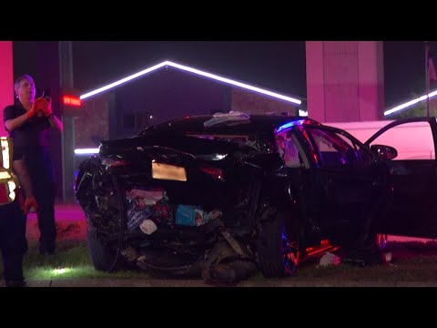 Three people hospitalized after their car was hit from behind, police say