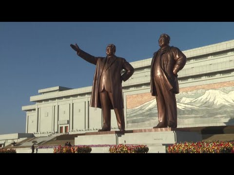 North Koreans lay flowers to mark Kim Jong Il's anniversary | AFP