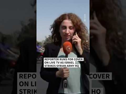 Reporter runs for cover on live TV as Israel strikes Syrian army headquarters | AFP #shorts