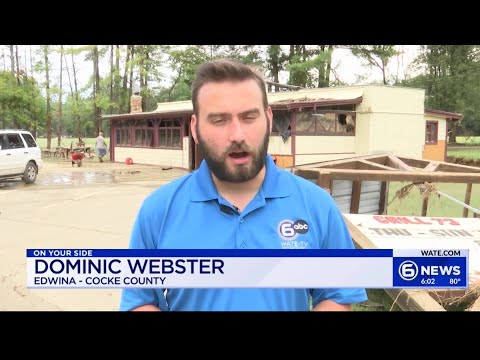 Business owner cleaning up after flood waters recede