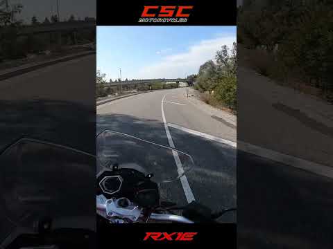 How does the RX1E electric motorcycle ride on the freeway?