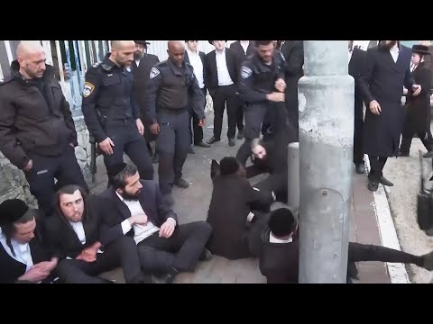 Israeli police remove ultra-Orthodox men from protest outside recruitment centre in Jerusalem