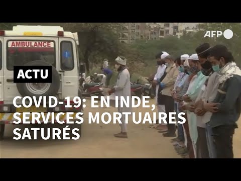Inde: les crématoriums et les cimetières surchargés par les décès dus au virus | AFP