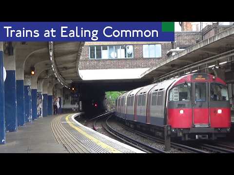 Lonndon Underground District And Piccadilly Line Trains At Ealing Common