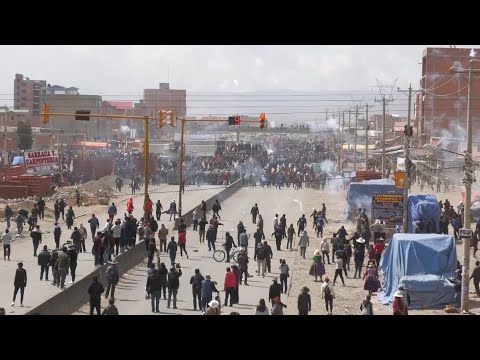 Rival factions clash as march led by former president Evo Morales advances in Bolivia