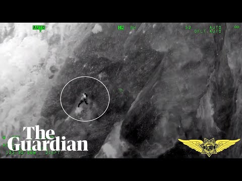 Man rescued while clinging on to cliff in California