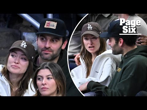 Olivia Wilde cozies up to actor Dane DiLiegro at Lakers game