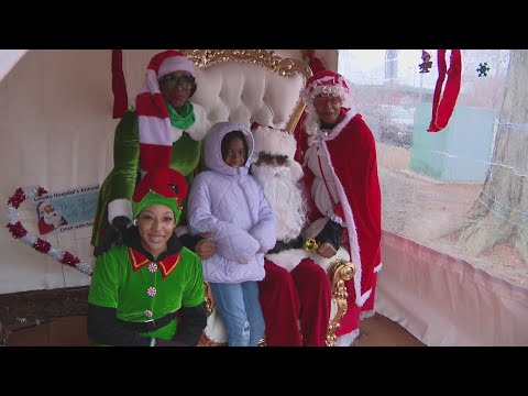 Santa Claus meets with families at Loretto Hospital