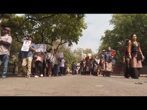 Tibetans in exile rally in New Delhi to commemorate 65th Tibetan National Uprising Day against China