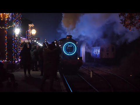 Vintage English steam train lit by 18,000 Christmas lights