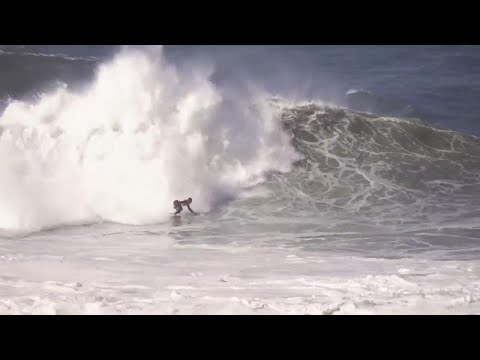 Surfers compete on powerful waves of over 13 feet in Brazil's Itacoatiara Big Wave event