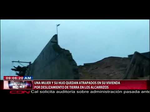 Una mujer y su hijo quedan atrapados en su vivienda por deslizamientos de tierra en Los Alcarrizos