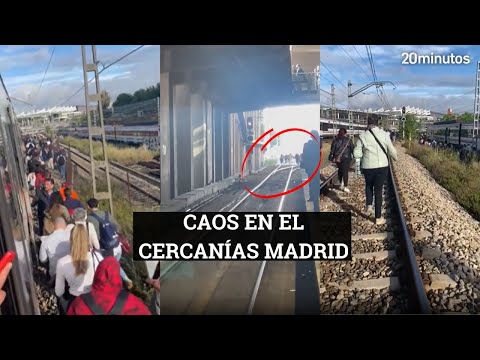 CERCANÍAS MADRID: decenas de pasajeros caminan por las vías del tren