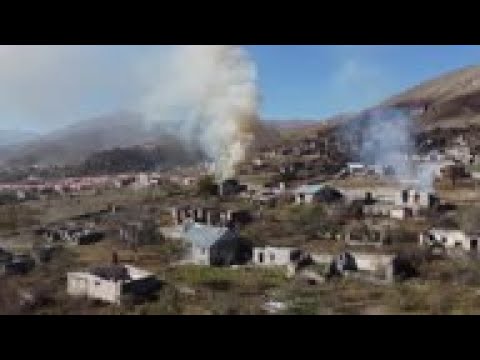 Ethnic Armenians flee village as Azeris take control