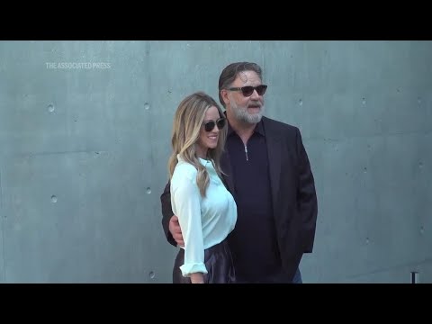 Russell Crowe wears jeans to Armani show in Milan