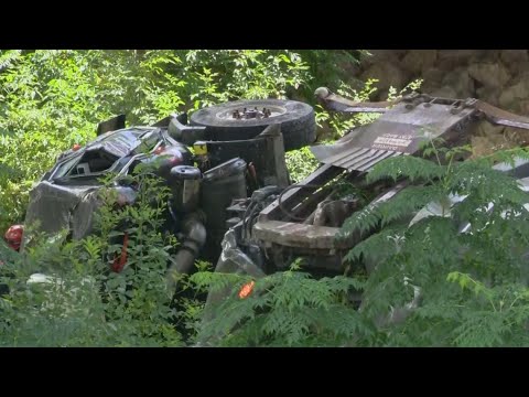 San Antonio garbage truck ends up flipped in ravine, driver hospitalized