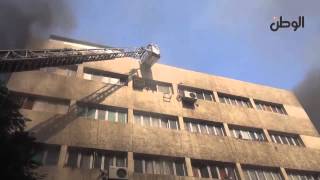 المطافئ تحاول إنقاذ موظفي محافظة الجيزة من الأدوار العليا