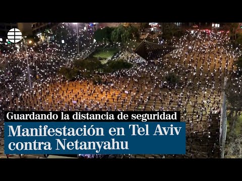 Miles de personas se manifiestan en Tel Aviv contra Netanyahu manteniendo la distancia de seguridad