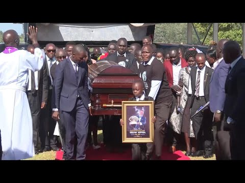 Mourners pay their last respects to Kenyan marathon runner Kelvin Kiptum at a funeral ceremony
