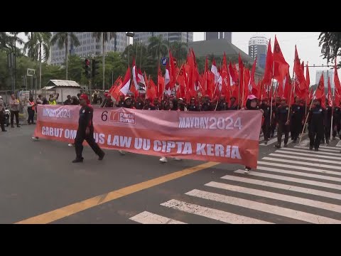 Indonesian workers vent anger on May Day at new law they say harms their rights
