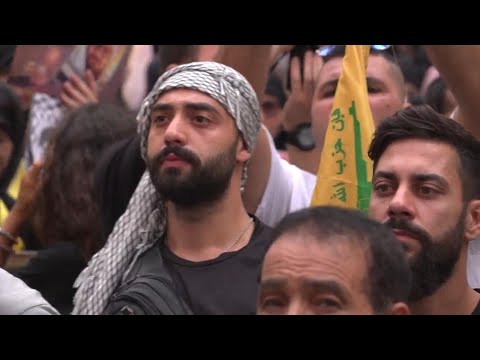 Dozens of Lebanese gather in Hezbollah stronghold in Beirut to show support for Palestinians