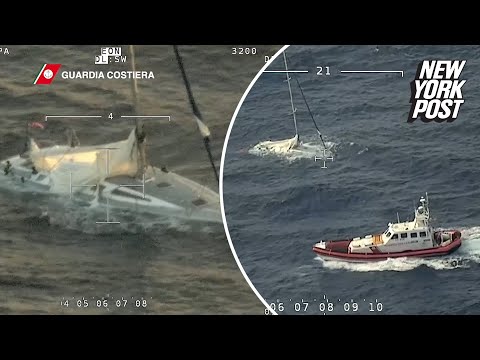 Coast guard video shows sunken sail boat carrying migrants off coast of Italy