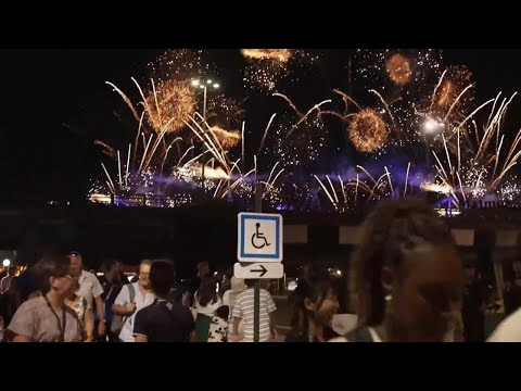 Fans react to the closing ceremony of the Paris Olympics