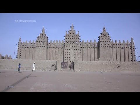 Mali's iconic mud brick mosque restored amid conflict and collapse of tourism