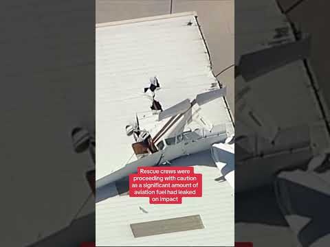 Pilot rescued as plane gets wedged in hangar roof