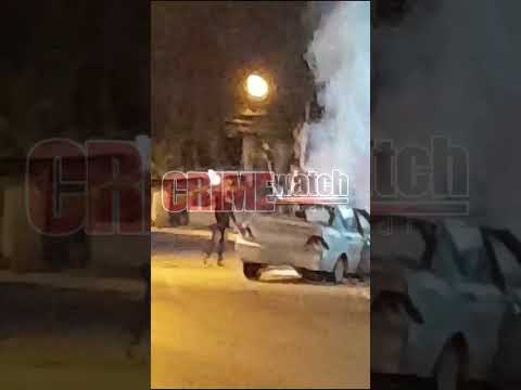 Cellphone footage captured a car on fire infront of the Freeport Police Station