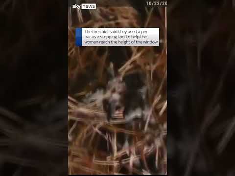 Woman pulled from burning house