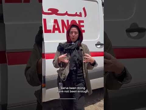 Activists take part in a land convoy from Libya to bring aid to Gaza