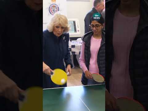 Queen Camilla enjoys table tennis match during visit to community centre #itvnews #royals