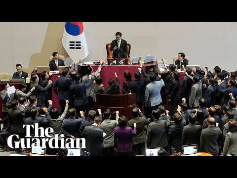 South Korean lawmakers chant during vote to impeach acting president