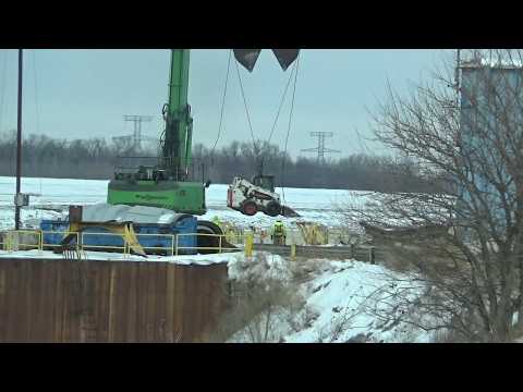 A day hauling steel coils from the barge where a bunch of bald eagles are on the ice