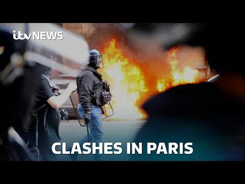 French police launch tear gas at protesters as country faces day of strikes | ITV News